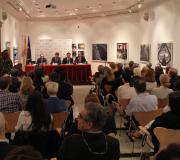 Un momento del acto, con público.