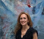 1. Marinela Fontoira ante unha das súas obras que funde unha paisaxe abstracta cunha figura realista.