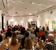 3. A mesa cos intervenientes e parte do público que asistiu ao acto.